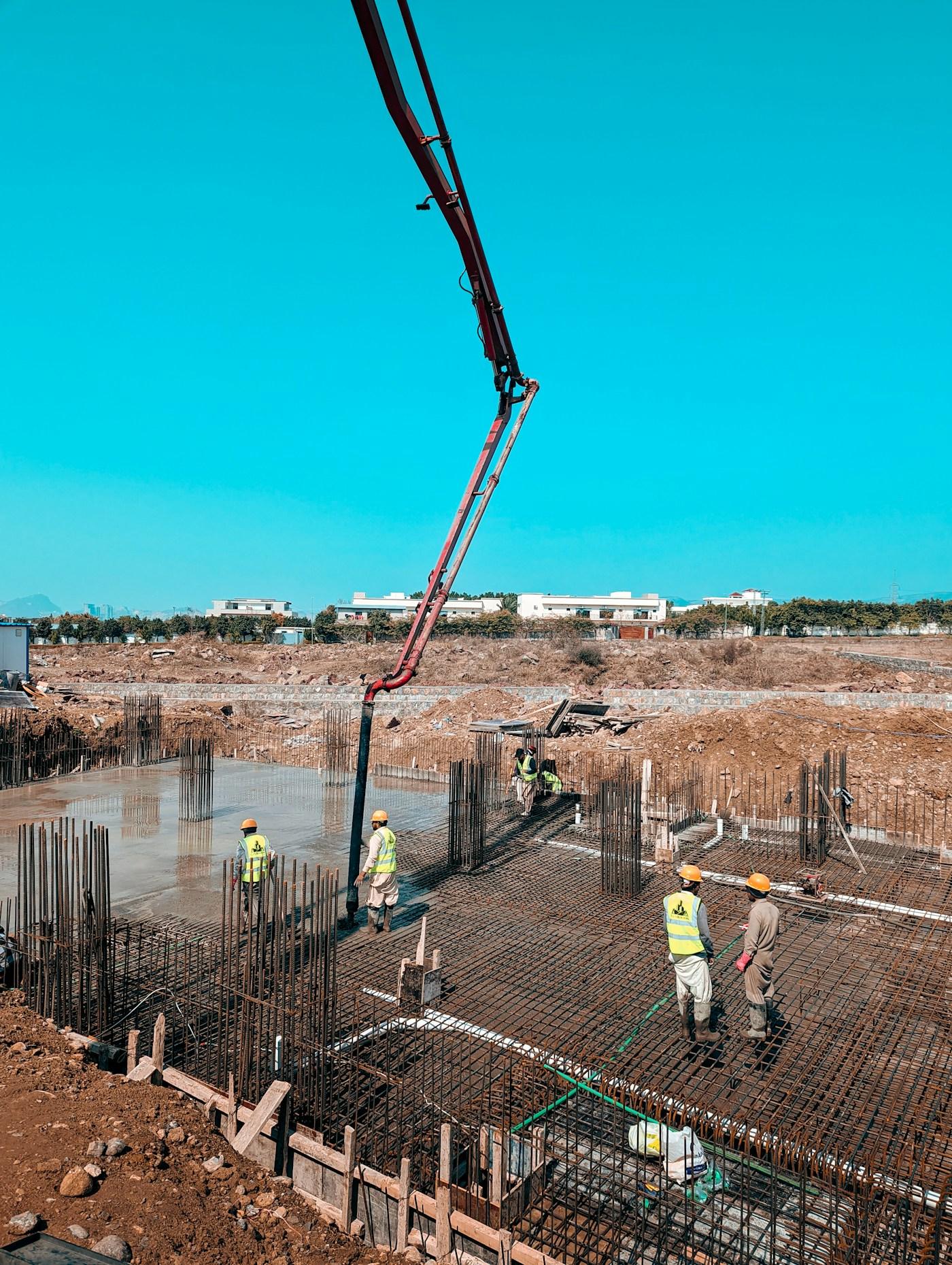 Construction team working on an active building site.